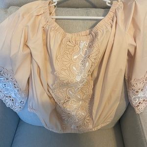 Express off the shoulder cotton and embroidered r top. Size L. Nude and white